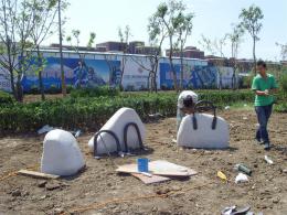 hj1736 石雕—箱包_青島國際服裝城不銹鋼雕塑、石雕、玻璃鋼雕塑_濱州宏景雕塑有限公司